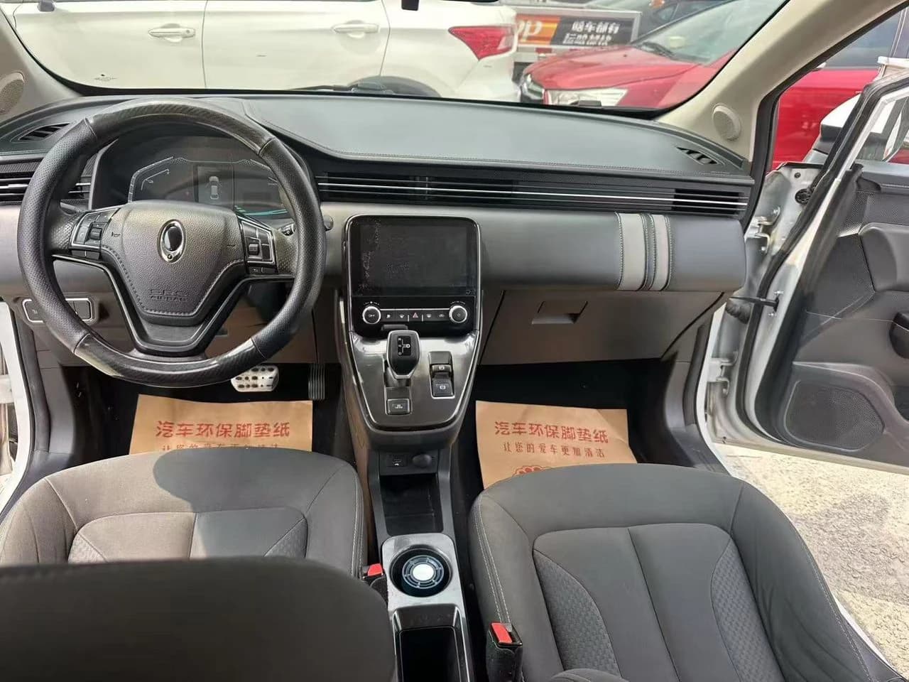 Dashboard and controls inside a modern electric vehicle